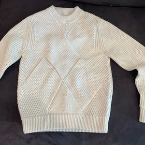 CAARA Sweater